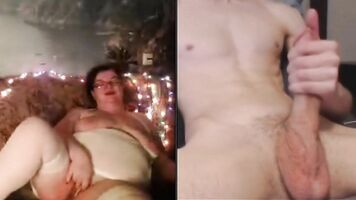 Guy jerks off on mature in front of webcam, close-up