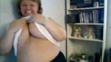 Mature Nancy playing with her boobs on webcam